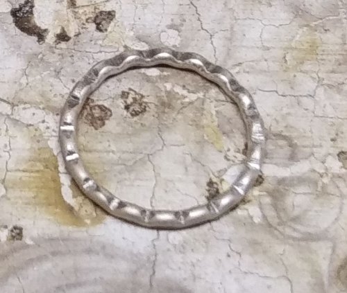 Judy Larson's Mike's Surpirise Claire's Ripple Pendant - , Contemporary Wire Jewelry, Jump Rings, Jump Ring, Making Jump Rings, Butane Torch, Soldering, Solder, Allow the ring to cool on the board.